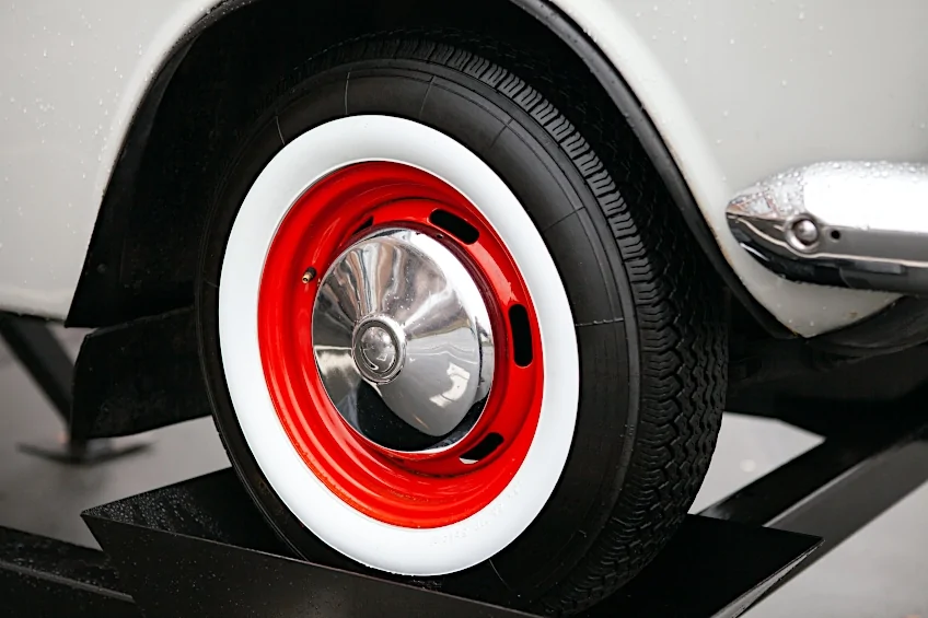 Whitewall Tire with Red Rims