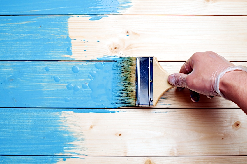 Applying Paint to Wooden Deck
