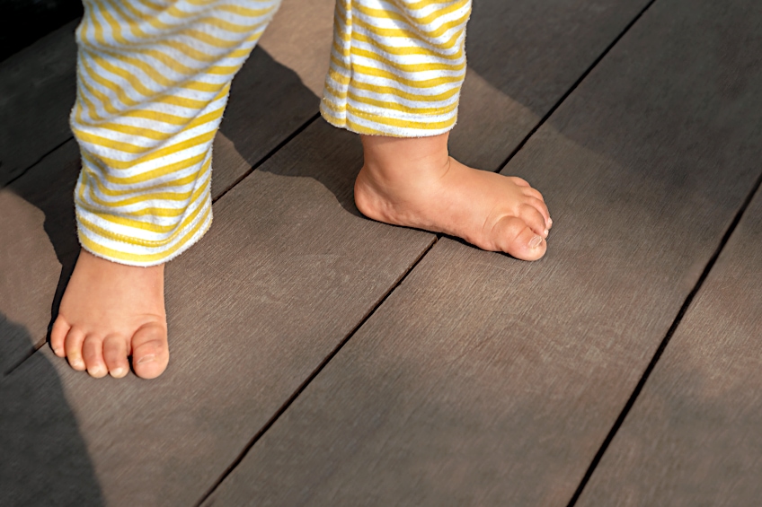 Child on Non-Slip Wooden Deck