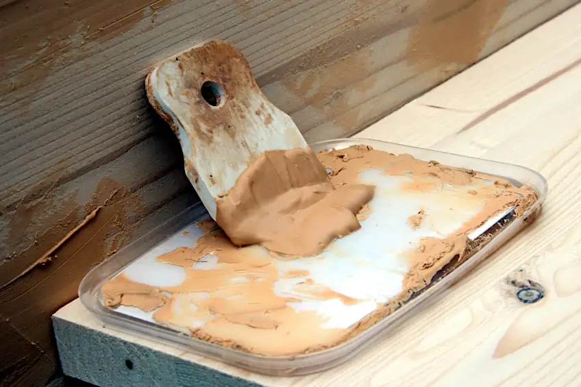 Fill Holes Before Spray-Painting Wood