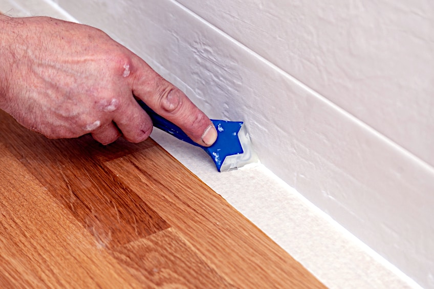 How to Smooth Caulk on Paint
